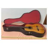 Estrella classical acoustic guitar likely