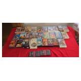 VHS tapes including Blazeing Westerns, Miracle on