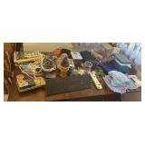 Assortment of items, extension cords, small lunch