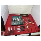 Kitchen silverware with knives and corn holders