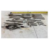 Various spade bits, twist drill bits, auger bits.