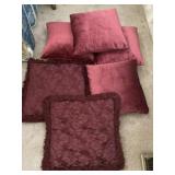 Six Burgundy Pillows