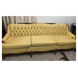 Yellow Ruffed Back Settee with Victorian Style
