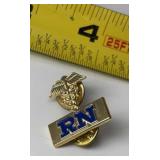 Registered Nurse (RN) lapel pin featuring a