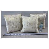 Decorative cream and gold damask throw pillows