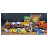 Toys including legos, Uno cards, Bow with arrow