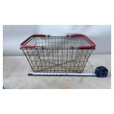 Metal wire grocery shopping basket with red