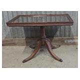 Mahogany side table with a glass top 26x18x18.5