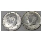 Two 1964 Kennedy half dollars