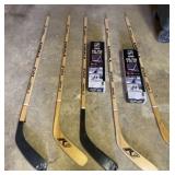 5 Hockey Sticks and Two Nets in Boxes