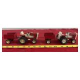 Two Small Red Tonka Tractors
