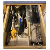 Contents of Drawer Knives, Strainer and Silverware