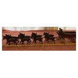 Cast Iron Clydesdales and Men, Dog, Barrels