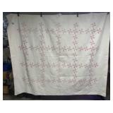 Homemade Pink Pinwheel Pattern Quilt