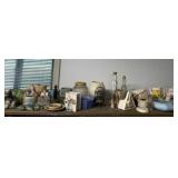 Contents of Top Shelf Including Planters and Old