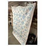 Homemade Blue Floral Pattern Quilt