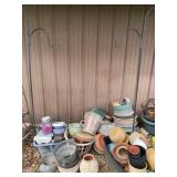 Two Shepherd Hooks and All Planters and Yard