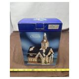 A "Holiday Time Village Collectible Church"
