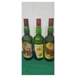 Three Bottles of Whiskey