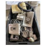 Tote with No Lid Full of Electronic Items