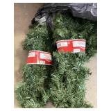 Two Garbage Bags of New 9 foot Pre Lit Pine