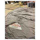 Coors Light Tent Top with some holes and stains