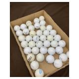 Flat of Golf Balls Including Titleist