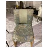 Two Black Cushioned Metal Chairs and Wood Cushion