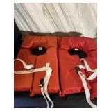 Two Universal Adult Flotation devices