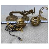 antique ornate cast iron and brass oil lamp wall