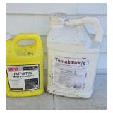 Two jugs of weed killer both full