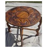 Carved elephant folding table reversible top