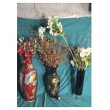 Large vases one with lighted flowers
