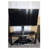 LG 61" flat screen TV with stand