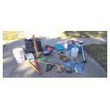 Two plastic totes Christmas lights caulking gun