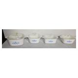 Four pieces of CorningWare with lids