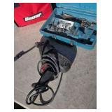 Electric drill with bits