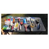 Drywall knives tape gun trash bags paint brushes