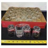 28 Heavy Shot Glasses Some With Advertising.