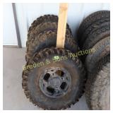 GROUP OF 4 USED ATV TIRES.