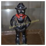 VINTAGE 5.5" CAST IRON "GIVE ME A PENNY" BANK.