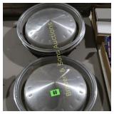 GROUP OF 4 VINTAGE CHRYSLER HUB CAPS.