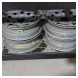 GROUP OF 4 USED 15" 5 BOLT RIMS.