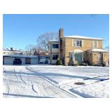 All Brick Duplex with 4 Car Garage at Online Auction