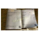 Auxiliary manuals and BMW service posters
