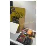 Box of motorcycle grips in advertising box