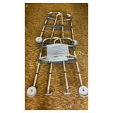 Two aluminum walkers