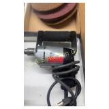Vintage Black and Decker drill on stand
