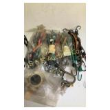 Three packs of NOS bungee cords plus more