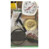 Thermometers, flashlight, & big magnifying glass